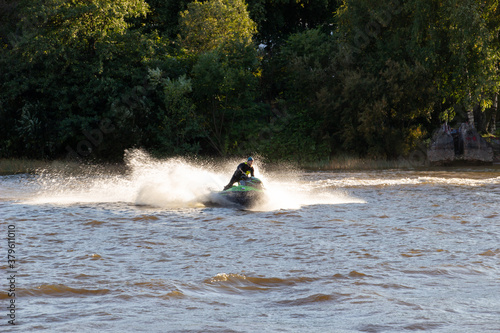 Russia, Pushkin-August 21, 2020:Photo of a jet ski swimming fast on the river