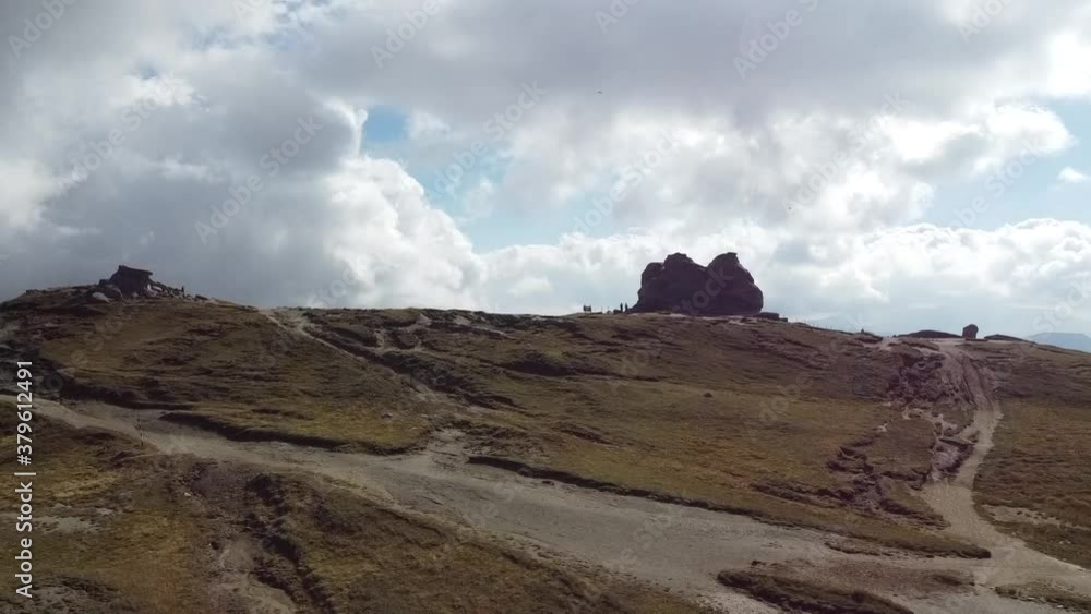 Drone aerial view of the Babele Pea, The Sphinx and the cable car on Bucegi Mountains in Romania Drone aerial view of the Babele Pea, The Sphinx and the cable car on Bucegi Mountains in Romania