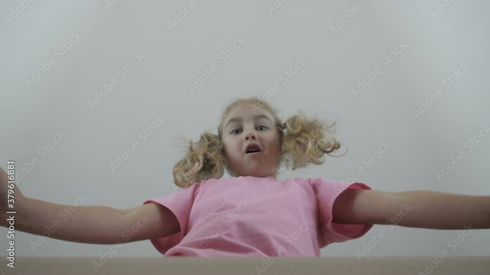 Little Girl Looks In Box, Surprised And Happy To Receive A Surprise. Child Opened A Box With A Gift. Slow Motion. Delivery Order In Celebration Birthday. Holiday Present Gift Christmas For Kid. Little Girl Looks In Box, Surprised And Happy To Receive A Surprise. Child Opened A Box With A Gift. Slow Motion. Delivery Order In Celebration Birthday. Holiday Present Gift Christmas For Kid.