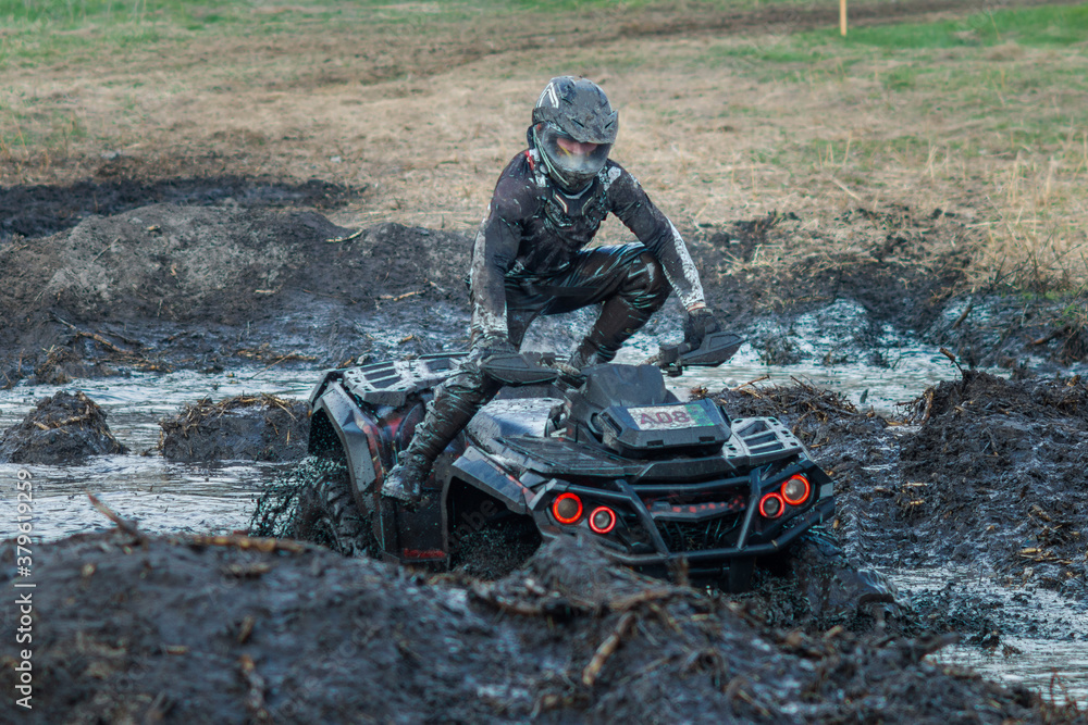 Overcoming a route on the off-road vehicle in the mud Overcoming a route on the off-road vehicle in the mud