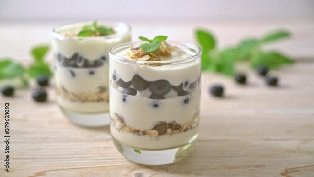 fresh blueberries and yogurt with granola - Healthy food style fresh blueberries and yogurt with granola - Healthy food style