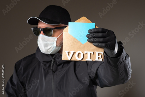 Man shows an envelope with ...