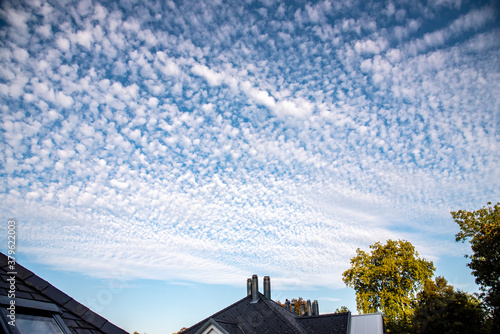 typical cirrocumulus clouds over Switzerland photo