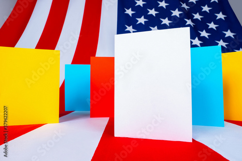 Fotografía Multicolored cards on USA flag background