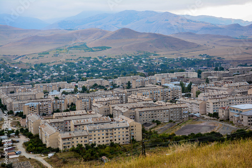 City from a bird's eye view. Residential buildings of the city. Bird's eye view of the Armenian city of Vanadzor photo