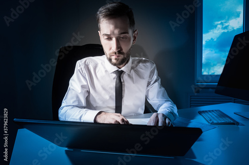 Businessman works in the ea...