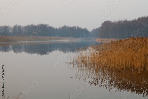 Morning fog on the lake, sunrise shot © makam1969