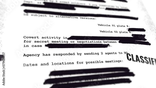 Camera moves over a top secret confidential document with blacked out text lines censored by government or official agency. Prohibited or leaked sensitive information not for publication or press