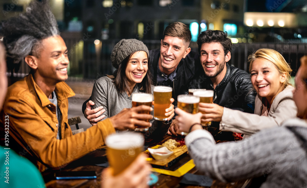 Happy friends group drinking beer at brewery bar out doors - Friendship lifestyle concept with young people enjoying time together at open air pub - Selective focus on girl with hat - obrazy, fototapety, plakaty 