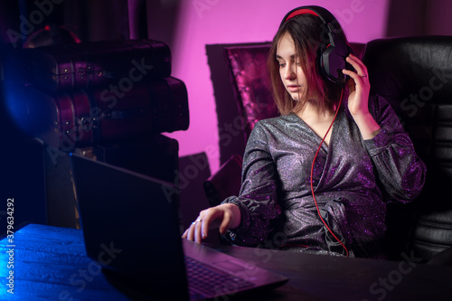 Girl in the headphones. Gir...