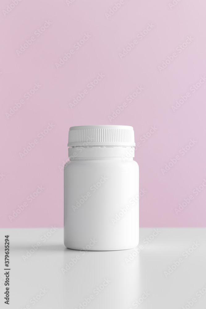 White pill bottle mockup with pink background. White pill bottle mockup with pink background.