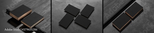 Black business card mock ups isolated on dark background. Three different business card mock ups on dark background. 3D illustration. photo
