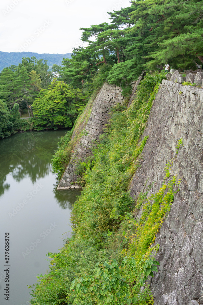 Stone wall of Igaueno castle in Japan