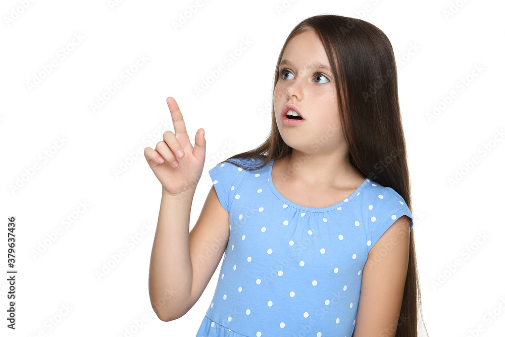 Young girl pointing by finger on white background Young girl pointing by finger on white background