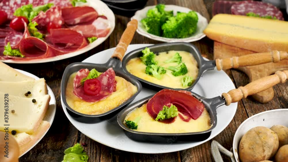 raclette cheese with salami, potato and broccoli raclette cheese with salami, potato and broccoli