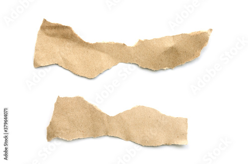 Recycled paper craft stick on a white background. Brown paper torn or ripped pieces of paper isolated on white background.