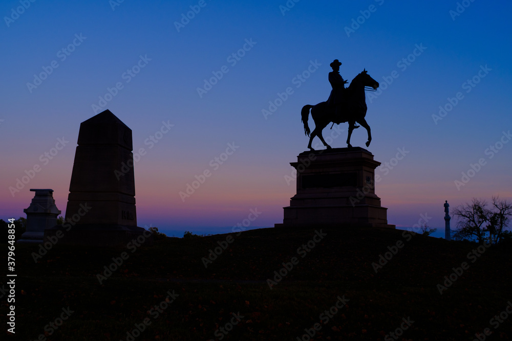 Statue of Major General Winfield Hancock on East Cemetery Hill at Gettysburg, Pa, USA at dusk. Statue of Major General Winfield Hancock on East Cemetery Hill at Gettysburg, Pa, USA at dusk.