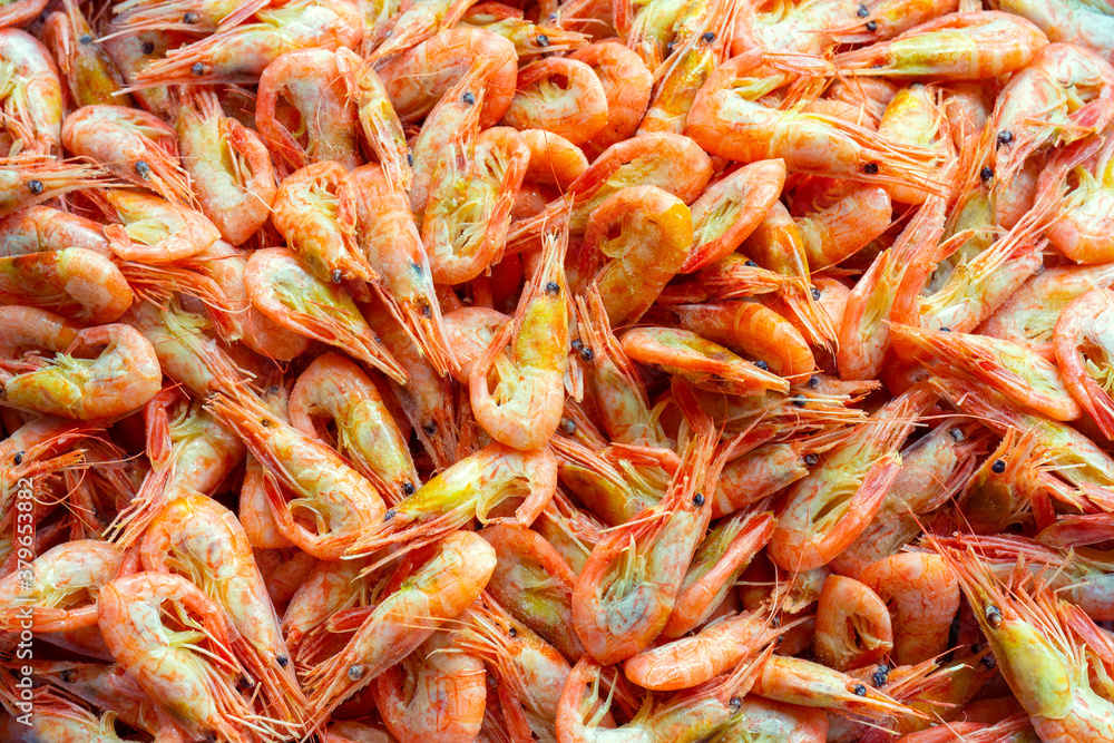Frozen shrimp. Selling seafood in the store. Delicious homemade product. Frozen shrimp. Selling seafood in the store. Delicious homemade product.