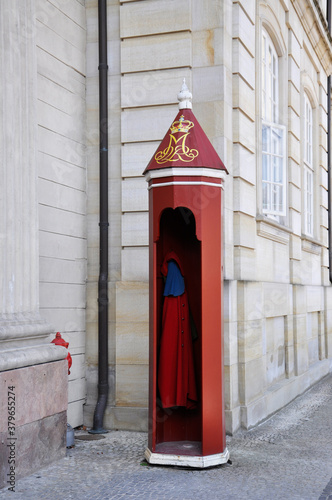 View of a special booth at the guard post near Amalienborg, where cloaks hang - a tribute to tradition, Copenhagen, Denmark.