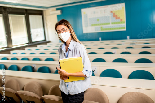 Female student wearing face...