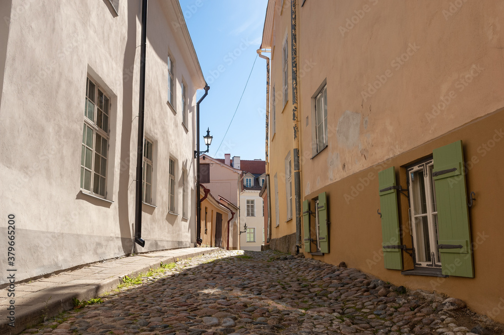 Typical narrow cobbled street in Tallinn Old Town, Estonia