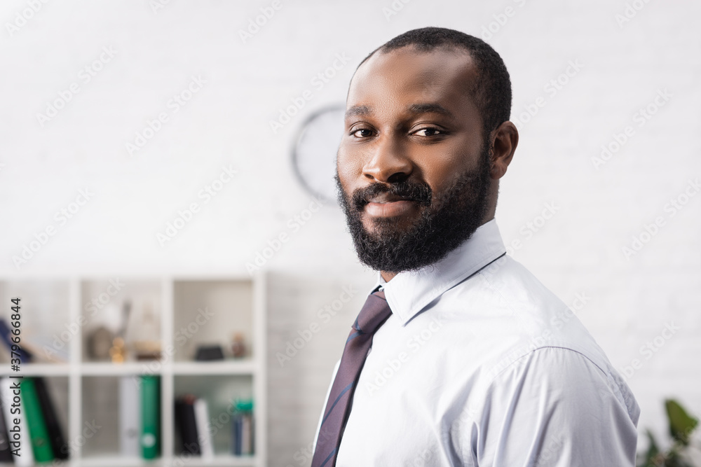 Selective focus of african american man looking at camera Selective focus of african american man looking at camera