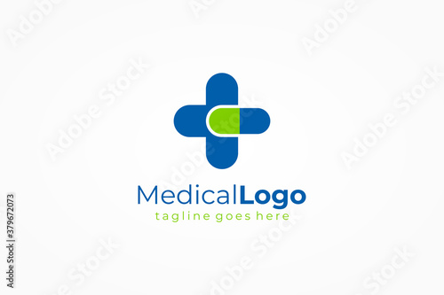 Abstract Medical Logo Health Symbol Pharmacy Icon. Blue and Green Capsule Medicine Cross Sign isolated on White Background. Flat Vector Logo Design Template Element
