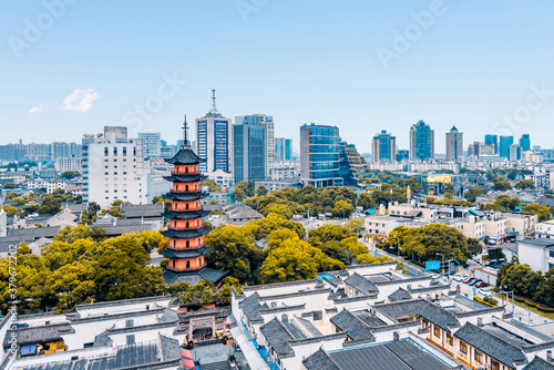 Scenery of Tianfeng Tower and Chenghuang Temple Pedestrian Street in Ningbo, Zhejiang, China photo