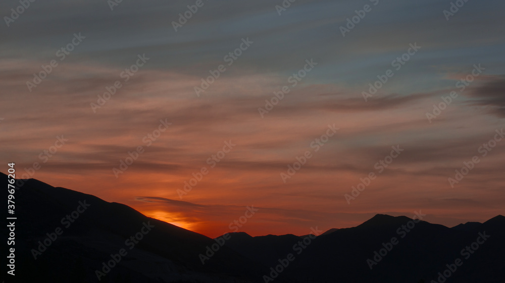 sunset over the mountains sunset over the mountains