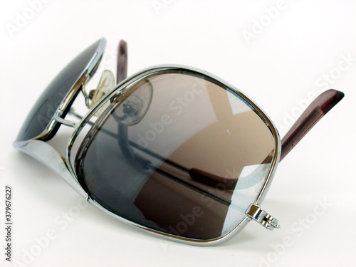 Isolated sunglasses with selective focus.