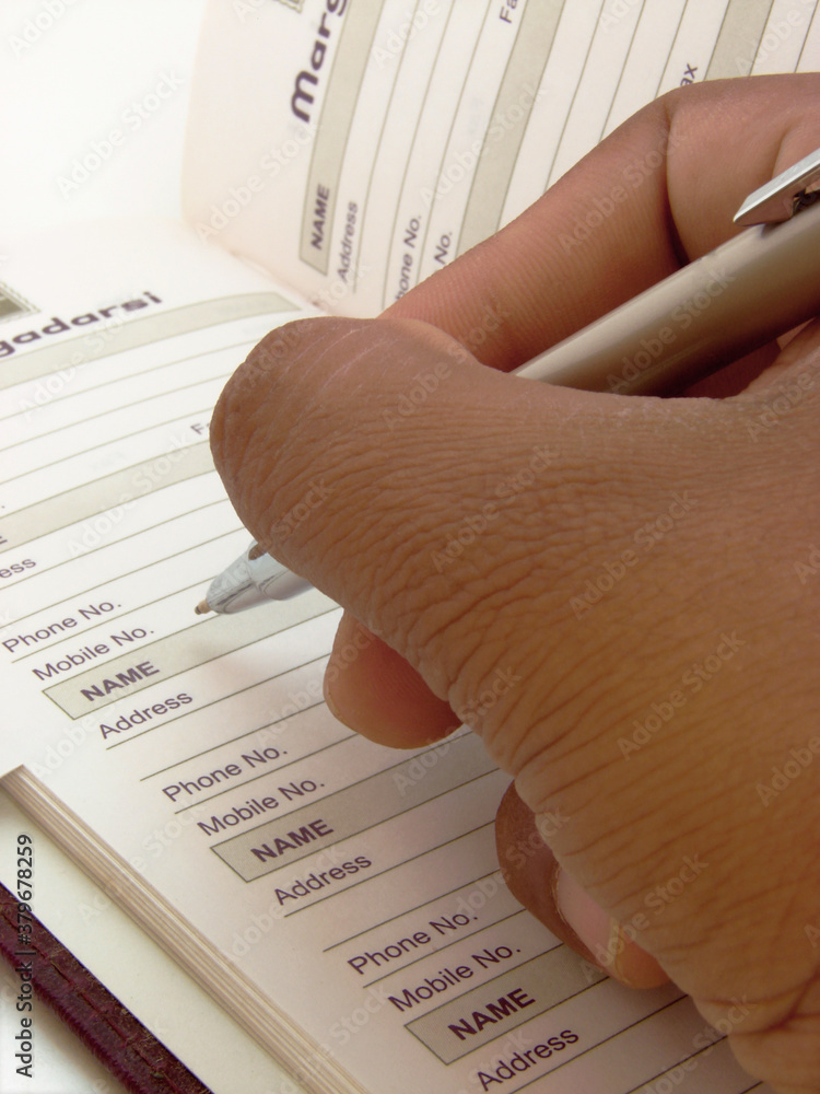Obraz premium Data entry in telephone book