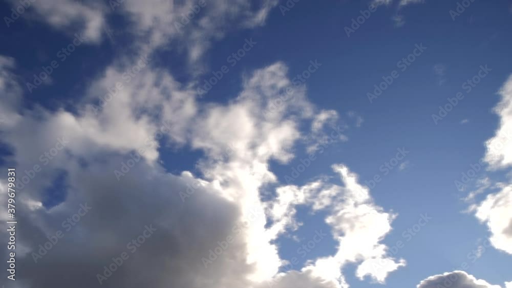 Clouds rolling over sky in windy daytime, low angle time lapse Clouds rolling over sky in windy daytime, low angle time lapse