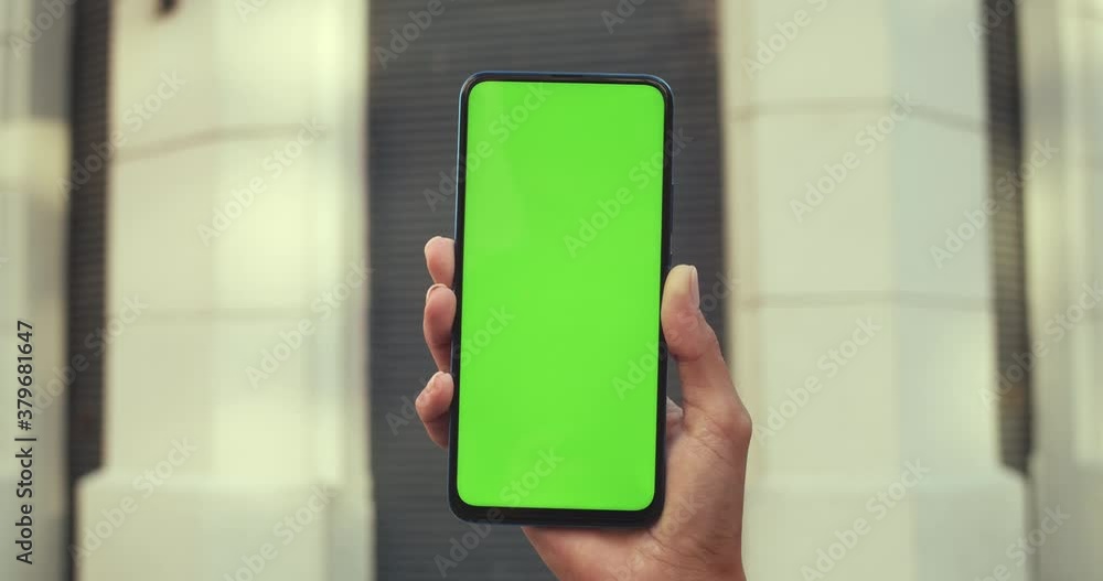 Close up view of female hand holding smartphone with mockup blank ...
