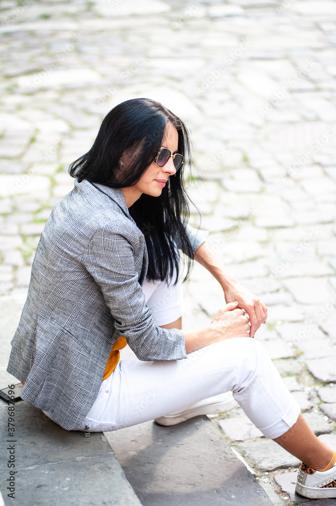 Young beautiful woman dressed in casual style in the city Young beautiful woman dressed in casual style in the city