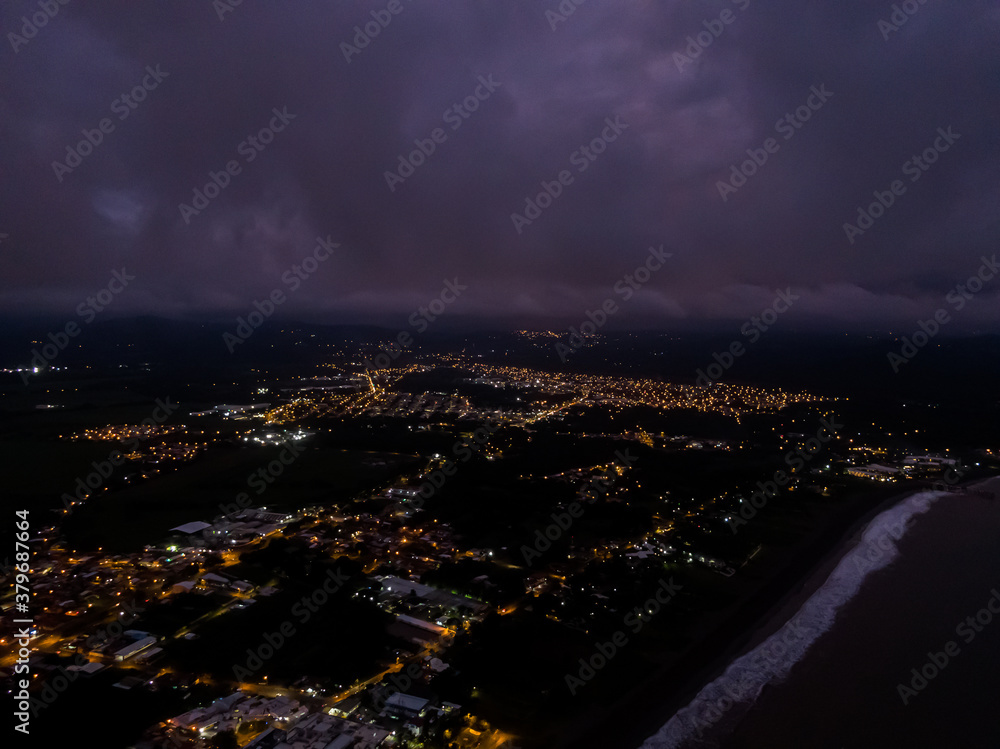 Beautiful aerial view of the City cover with lights at night of Puntarenas,