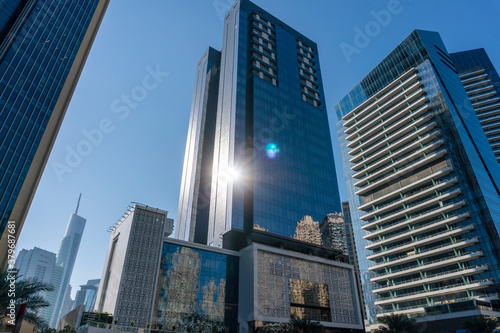 Jacht and Skyscrapers Above the Water of Persian Gulf in Dubai Marina District in UAE