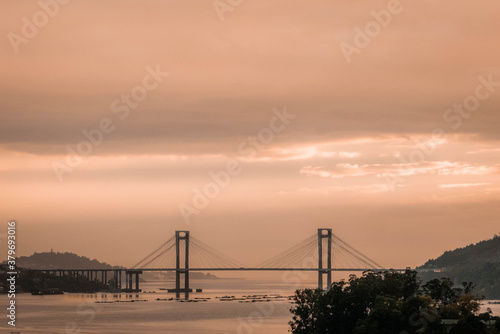 cable-stayed bridge at sunset