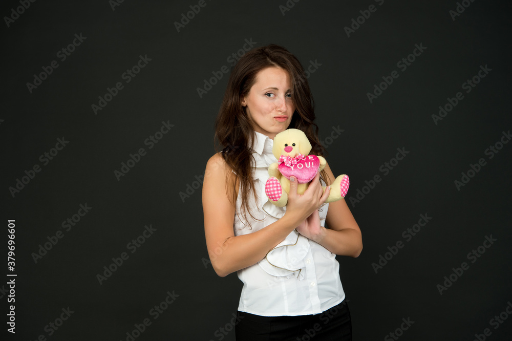 be my valentine. pretty woman hold teddy bear. romantic present with love. toy shop for holidays. cheerful girl in white shirt play with bear toy. gift for date. happy valentines day be my valentine. pretty woman hold teddy bear. romantic present with love. toy shop for holidays. cheerful girl in white shirt play with bear toy. gift for date. happy valentines day