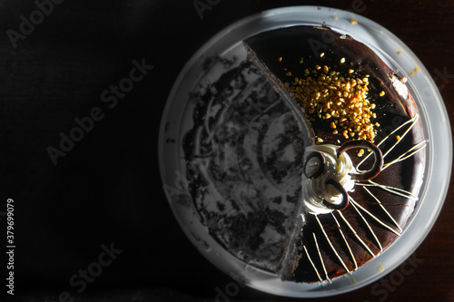  Top view of cheesecake with a biscuit in a cut. close-up. selective focus 