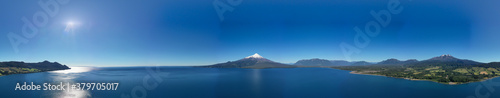 Aerial PANORAMIC landscape of Osorno Volcano and Llanquihue Lake - Puerto Varas, Chile, South America.