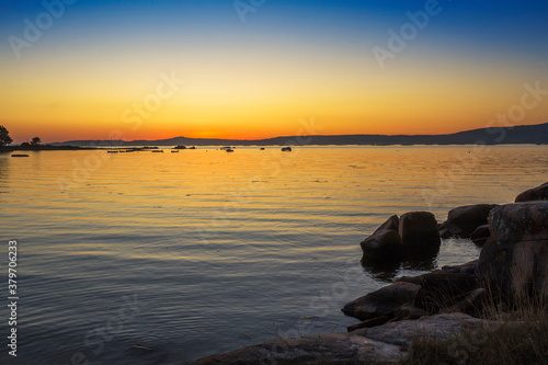 Fototapeta Naklejka Na Ścianę i Meble -  Golden twilight on the estuary