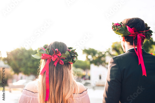 Obraz na płótnie Corone di laurea italiana con foglie di alloro e università