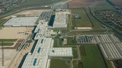 Modern factory in the countryside. Huge industrial complex among picturesque green fields. New manufacture among nature. Aerial view. Slovakia nitra Land Rover Jaguar