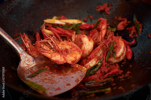 Spicy roasted shrimp in a pan. Asian Traditional Foods 