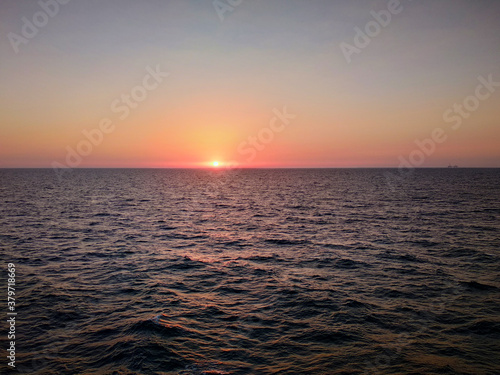 sunset in the sea © Sabir