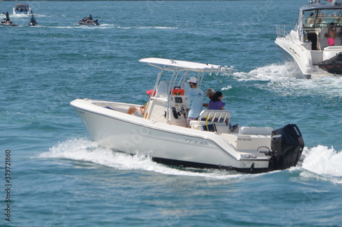 Motor boat and a sport fishing boat on Biscayne Bay off of Miami Beach,Florida.