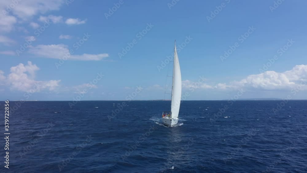 Yacht sailing at sunset. Luxury vacation at sea. Yacht sailing at sunset. Luxury vacation at sea.