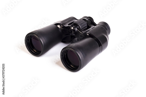 modern binoculars in black on a white background. Lenses forward. Close-up. There is no isolation