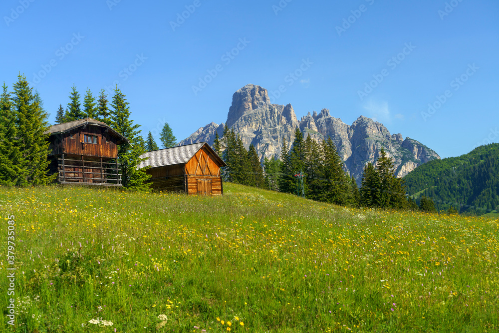 Mountain landscape along the road to Campolongo pass, Dolomites Mountain landscape along the road to Campolongo pass, Dolomites
