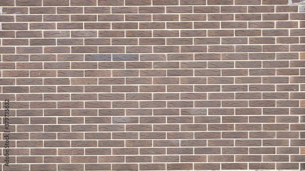 smooth brick wall of dark texture blocks with clear white seams, abstract design decorative background smooth brick wall of dark texture blocks with clear white seams, abstract design decorative background